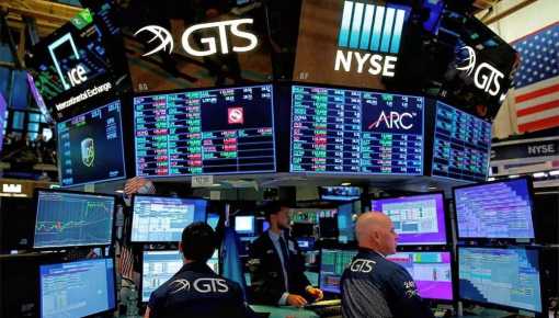 Fuerte caída de acciones y bonos en medio del avance del dólar